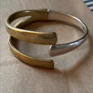 Lucky Brand two-tone hinged bracelet.